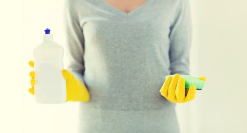 Local cleaners carrying out deep cleaning in a Bow flat