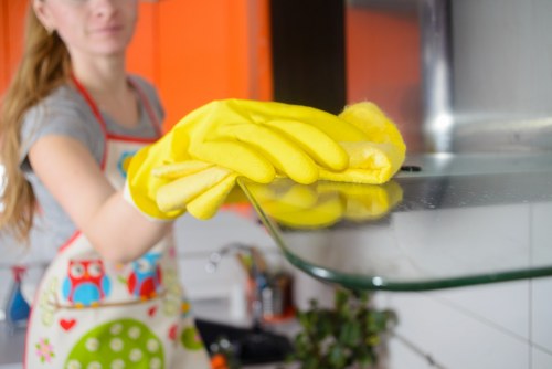 Cleaner preparing supplies for a residential or small business property in Bow